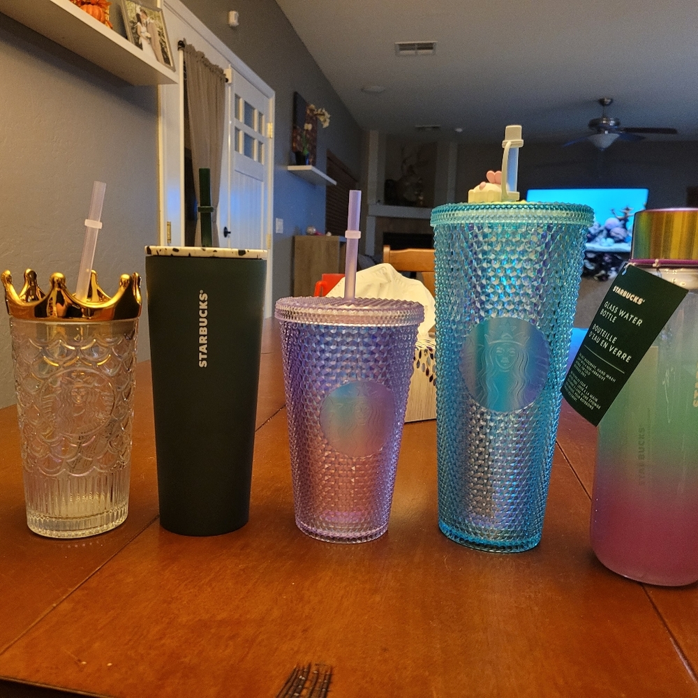 4 Starbucks tumblers and bottle